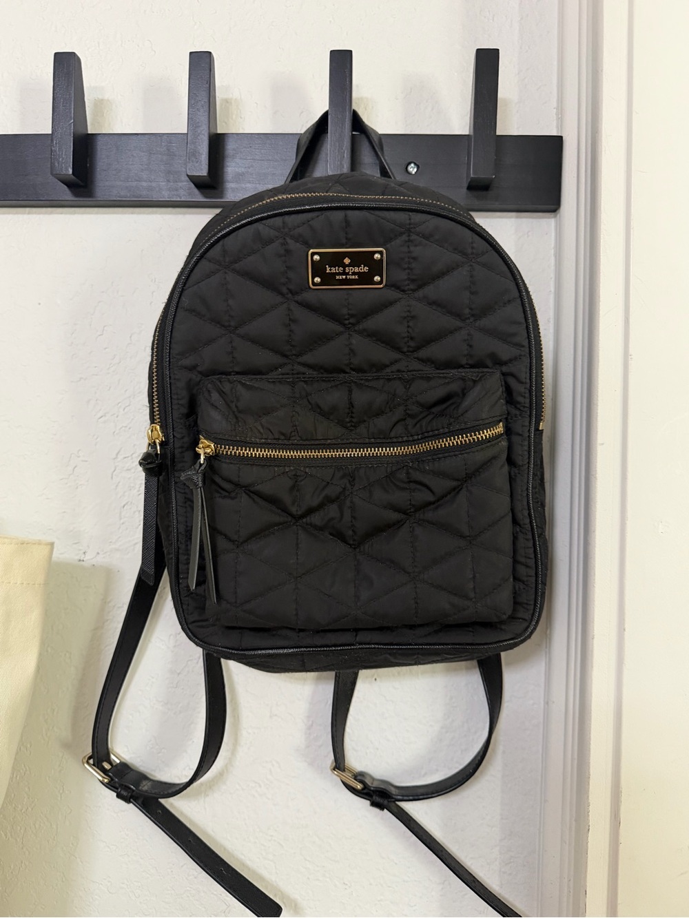 kate spade black quilted mini backpack with gold hardware
